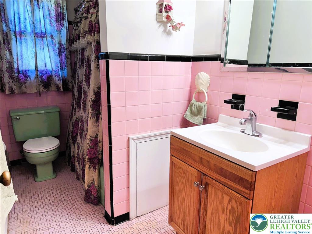 127 South 7th Street Coplay, PA 18037 - Photo 14 of 21 a bathroom with a sink and a mirror