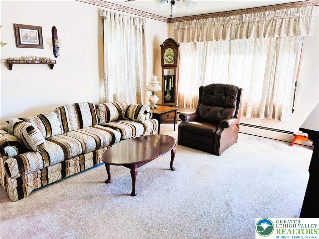 127 South 7th Street Coplay, PA 18037 - Photo 8 of 21 a living room with furniture and a large window