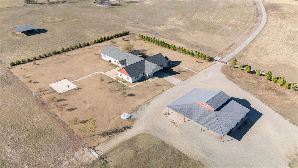 2263 County Road 33040, Unit 2 Brookston, TX 75421 - Photo 3 of 36 an aerial view of a house