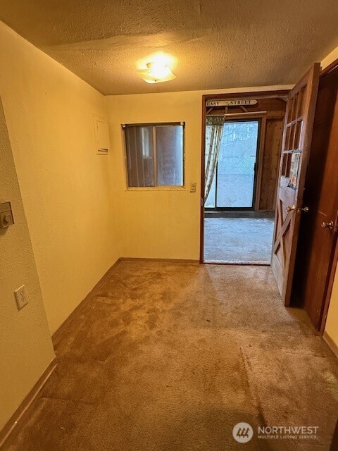 12018 Sand Point Way Northeast Seattle, WA 98125 - Photo 12 of 14 a view of an empty room