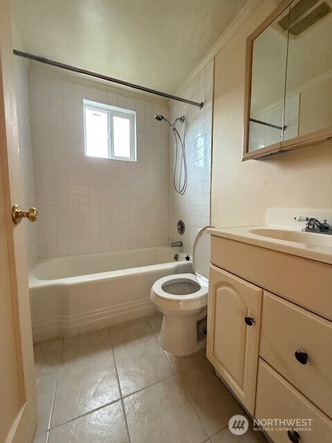 12018 Sand Point Way Northeast Seattle, WA 98125 - Photo 7 of 14 a bathroom with a toilet sink and shower