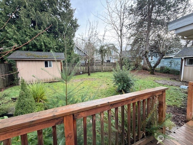 12018 Sand Point Way Northeast Seattle, WA 98125 - Photo 9 of 14 a view of a wooden fence