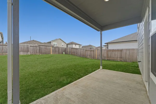 a view of a back yard of the house