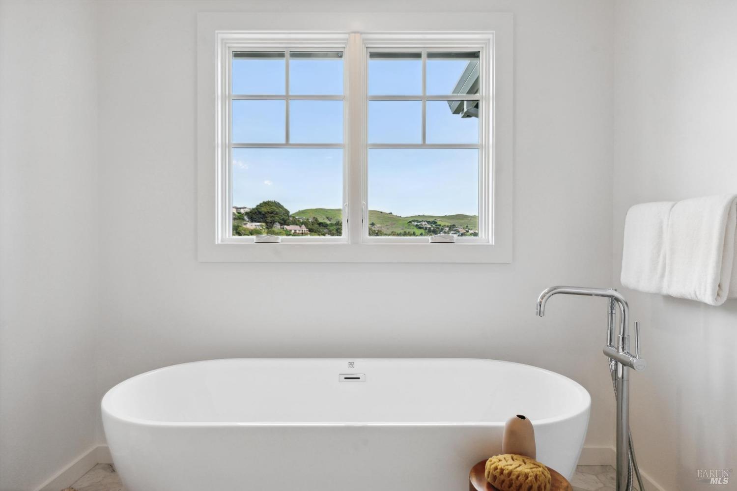 144 Richardson Drive Mill Valley, CA 94941 - Photo 17 of 43 a white bath tub sitting next to a window