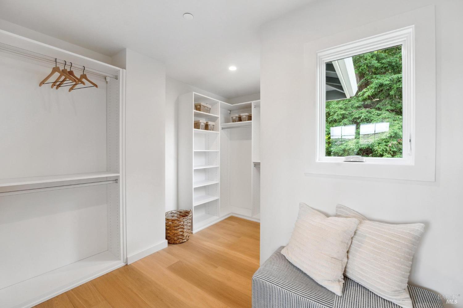 144 Richardson Drive Mill Valley, CA 94941 - Photo 19 of 43 a bedroom with a bed and a window