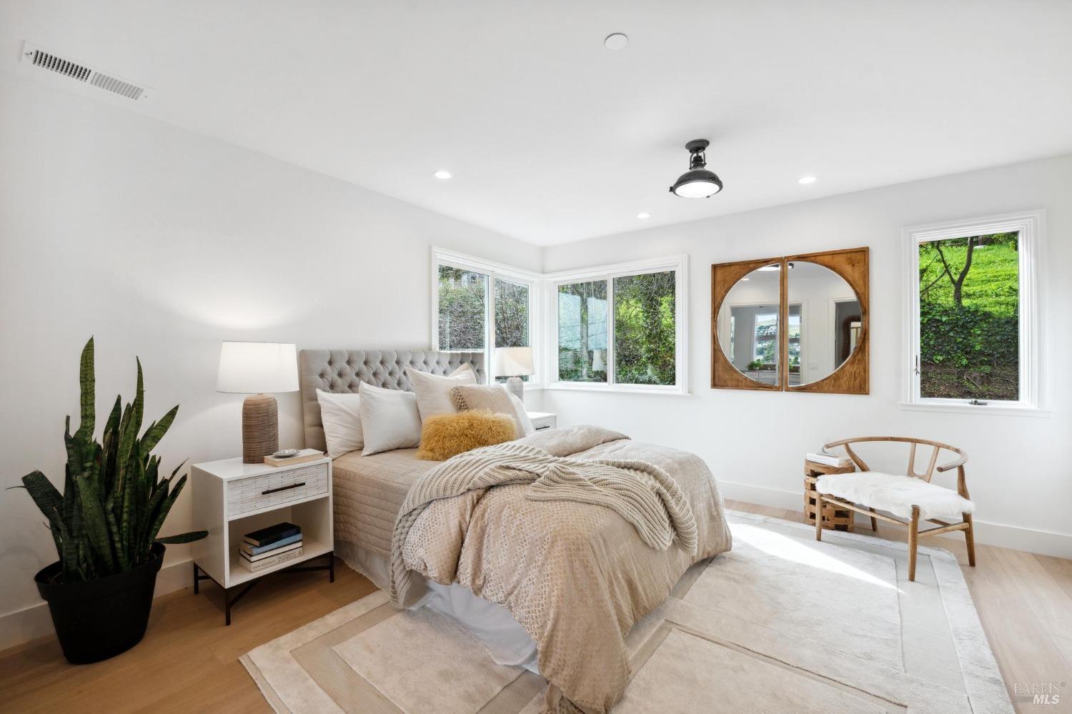 144 Richardson Drive Mill Valley, CA 94941 - Photo 20 of 43 a bedroom with furniture and a large window