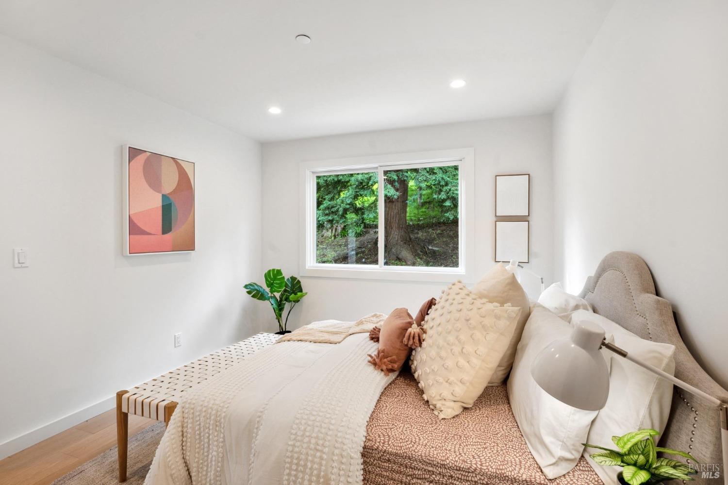 144 Richardson Drive Mill Valley, CA 94941 - Photo 26 of 43 a bedroom with furniture and a window