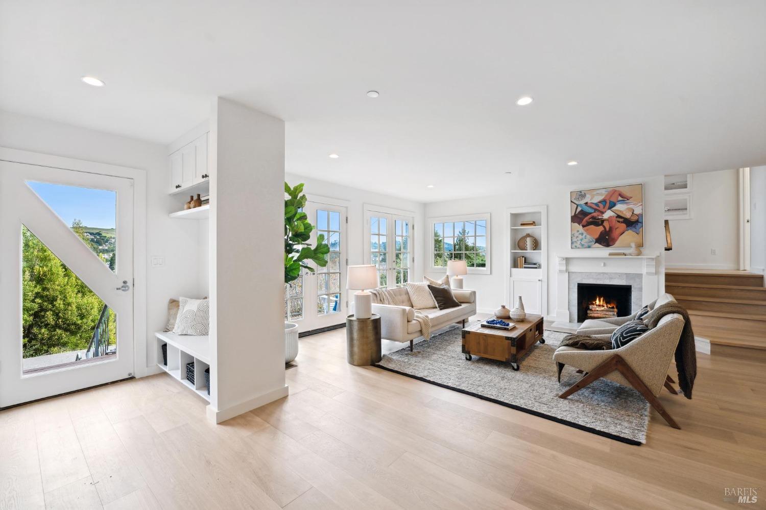 144 Richardson Drive Mill Valley, CA 94941 - Photo 3 of 43 a living room with furniture and a fireplace