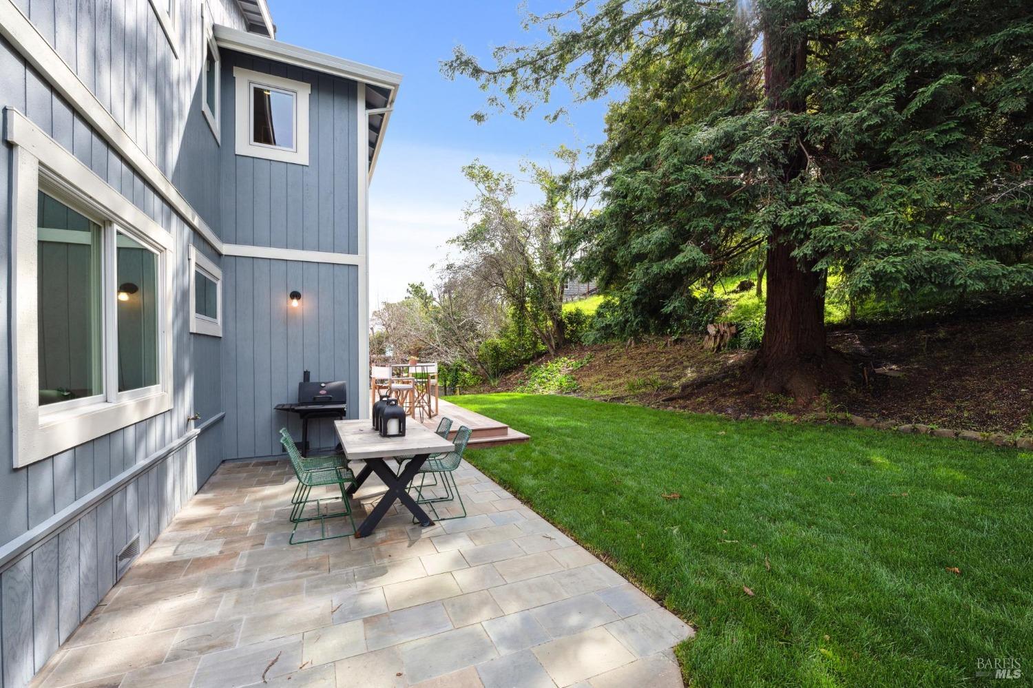 144 Richardson Drive Mill Valley, CA 94941 - Photo 35 of 43 a view of a patio with a table and chairs in a patio