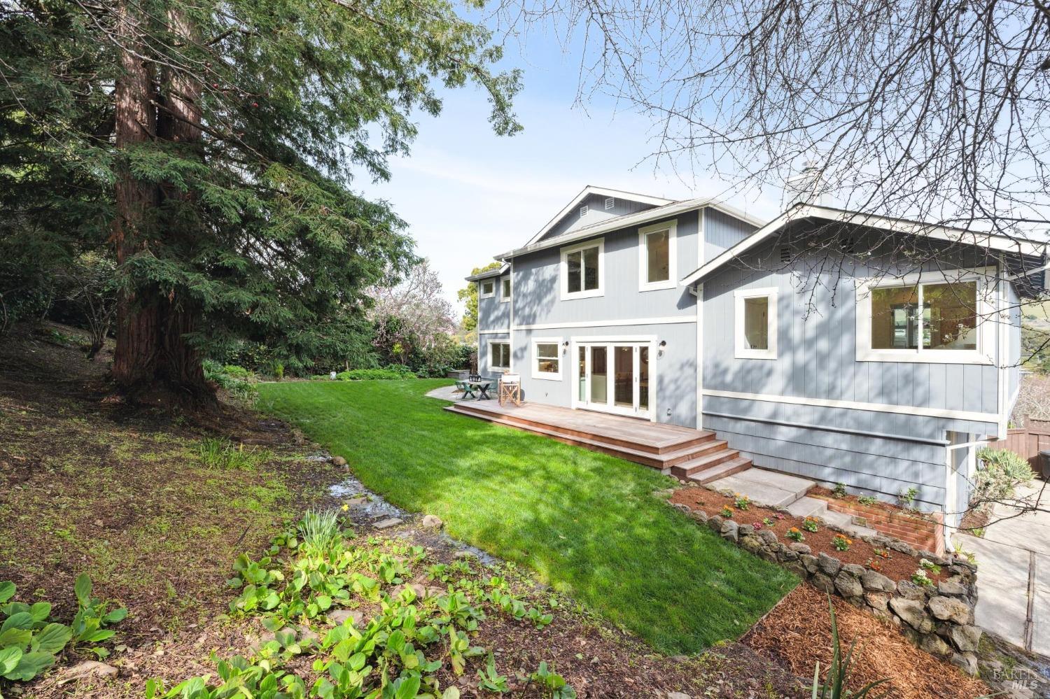 144 Richardson Drive Mill Valley, CA 94941 - Photo 37 of 43 a white house that has a tree in it