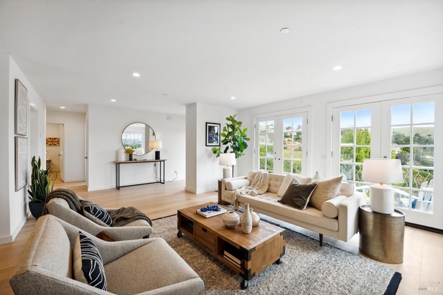 144 Richardson Drive Mill Valley, CA 94941 - Photo 4 of 43 a living room with furniture and a large window