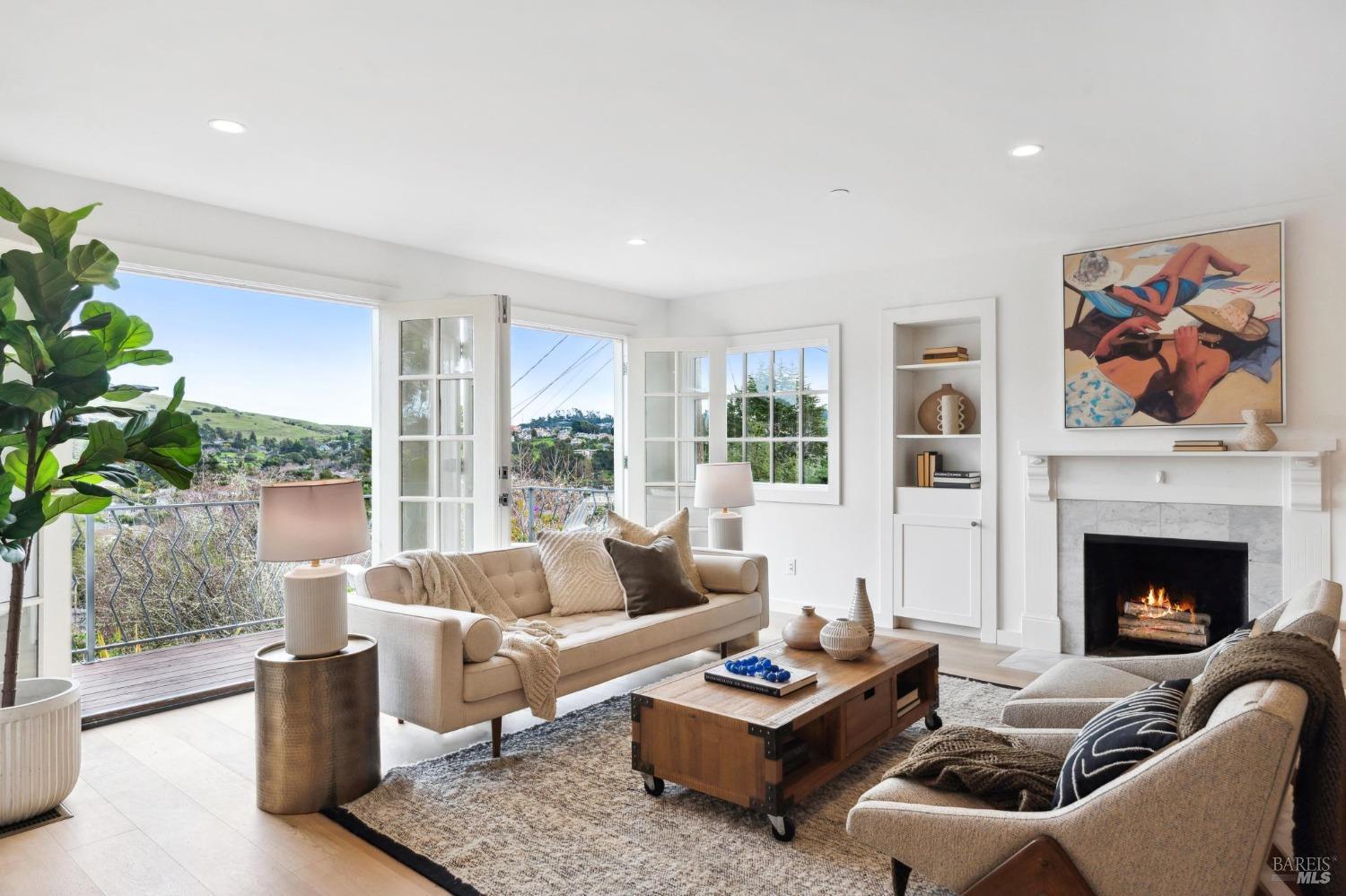 144 Richardson Drive Mill Valley, CA 94941 - Photo 5 of 43 a living room with furniture and a fireplace