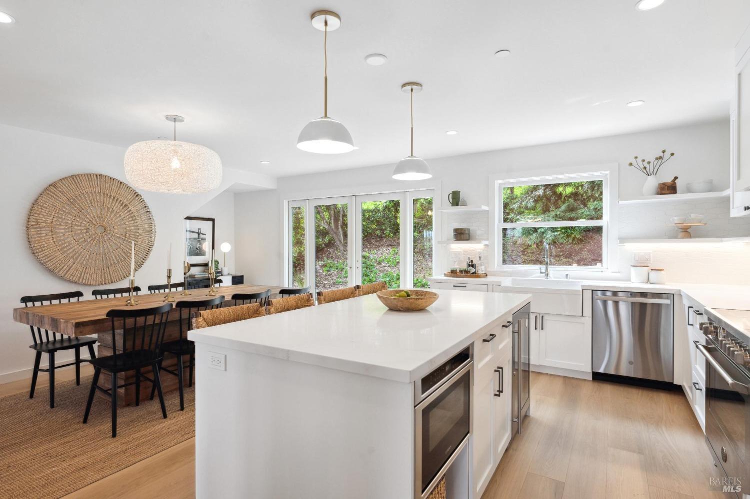 144 Richardson Drive Mill Valley, CA 94941 - Photo 9 of 43 a kitchen that has a sink a stove and a wooden floor