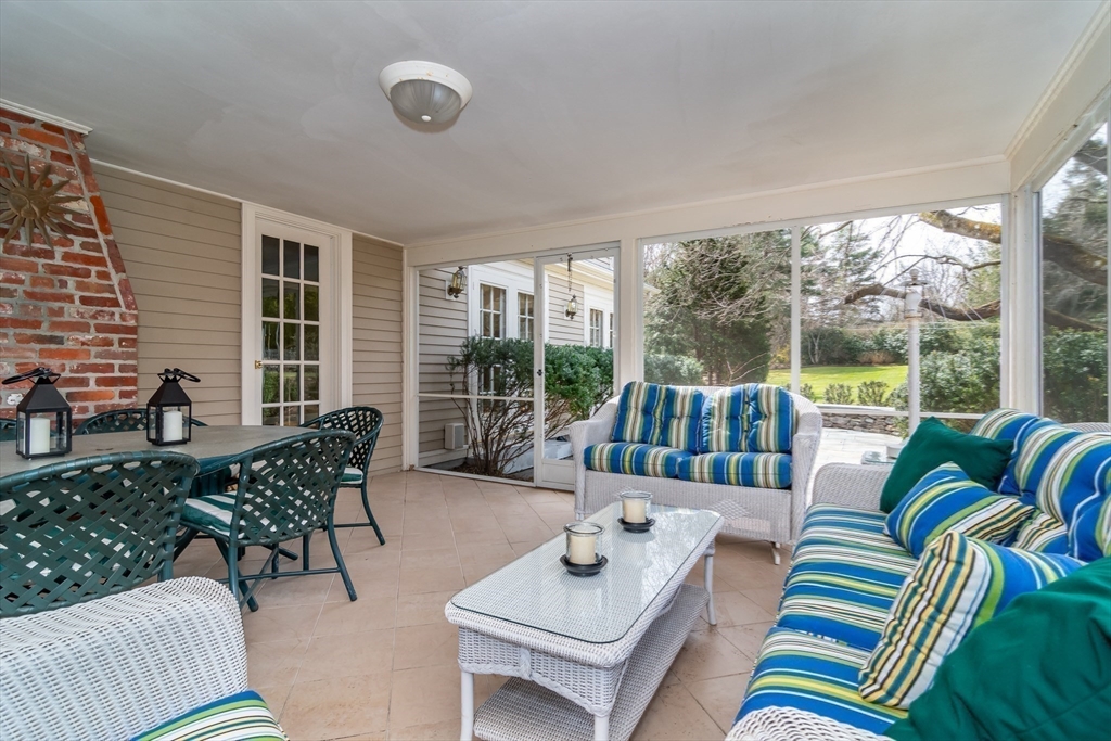 25 Edgewater Drive Needham, MA 02492 - Photo 15 of 25 a living room with furniture and a large window