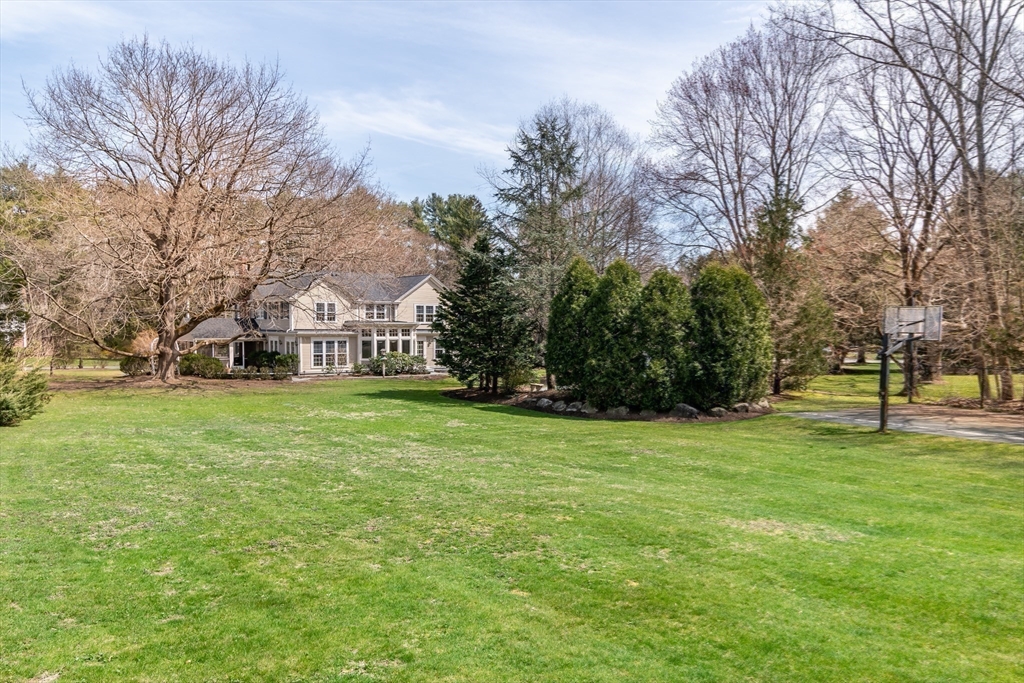 25 Edgewater Drive Needham, MA 02492 - Photo 21 of 25 a view of a trees in front of a house