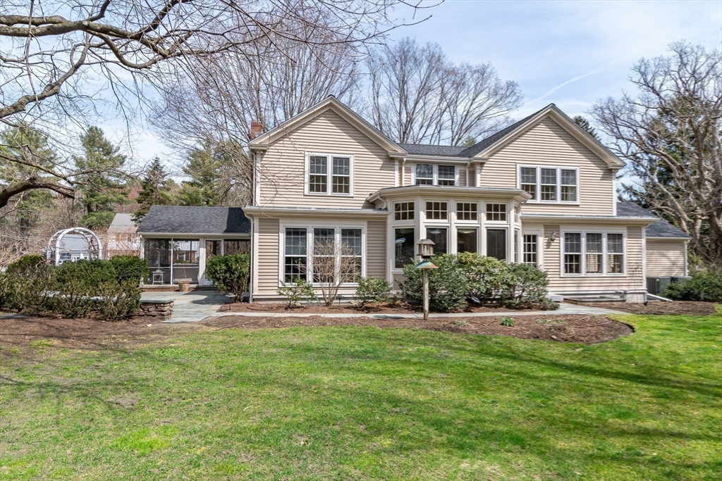 25 Edgewater Drive Needham, MA 02492 - Photo 22 of 25 a front view of a house with a yard