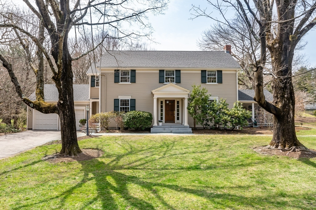 25 Edgewater Drive Needham, MA 02492 - Photo 25 of 25 a front view of a house with a yard
