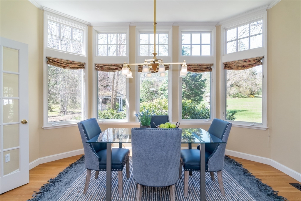 25 Edgewater Drive Needham, MA 02492 - Photo 6 of 25 a view of a dining room with furniture and windows