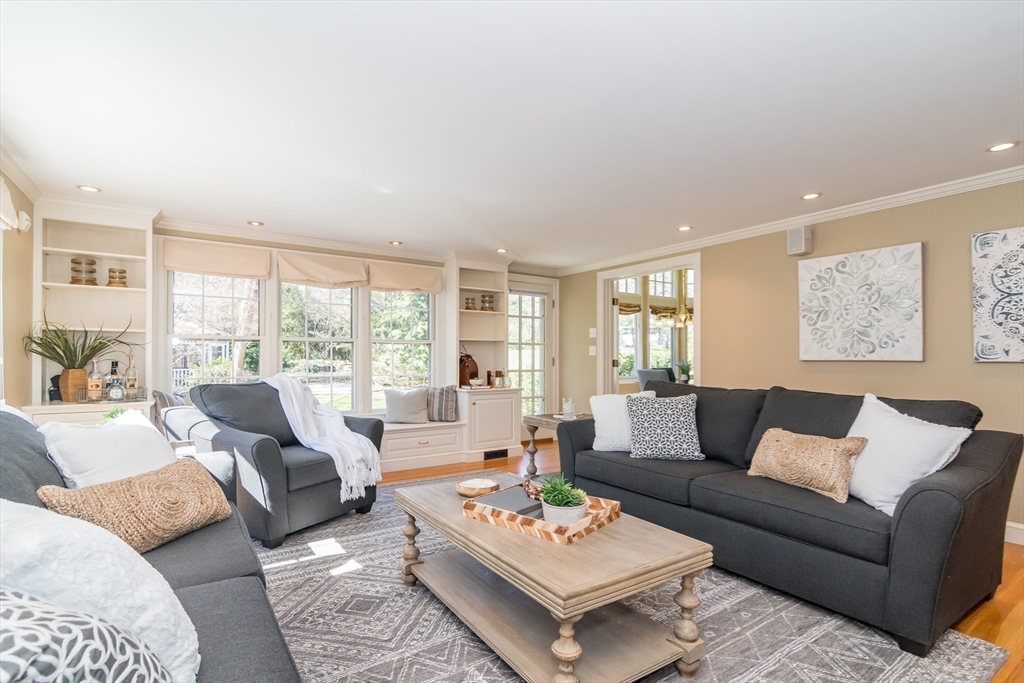 25 Edgewater Drive Needham, MA 02492 - Photo 8 of 25 a living room with furniture couches and a large window