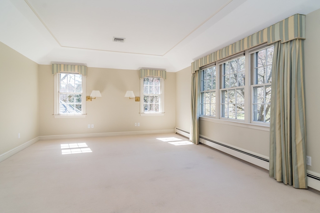 25 Edgewater Drive Needham, MA 02492 - Photo 10 of 25 a view of an empty room with a window