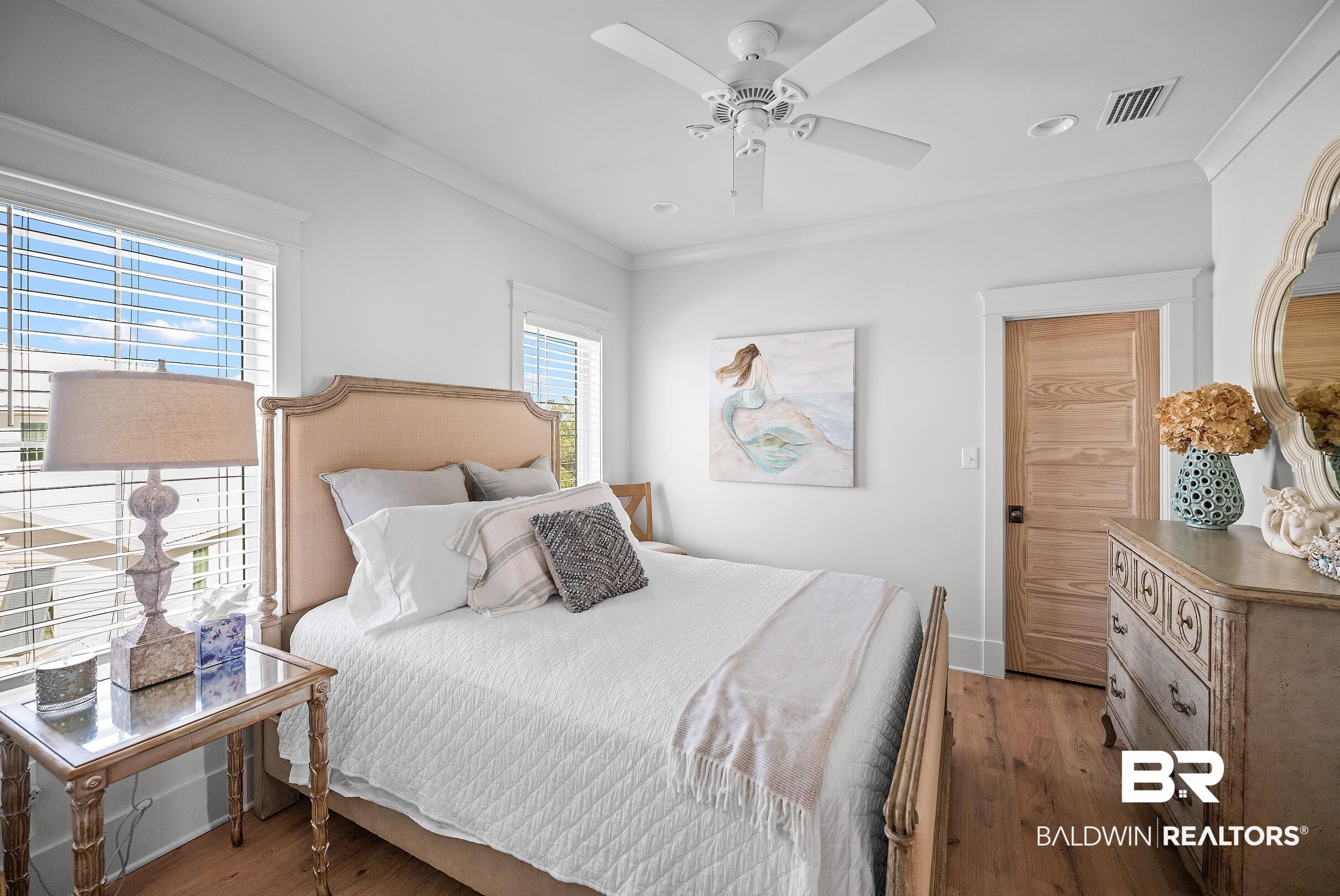 33186 Marlin Key Drive Orange Beach, AL 36561 - Photo 59 of 87 Bedroom featuring wood finished floors, crown molding, and a ceiling fan