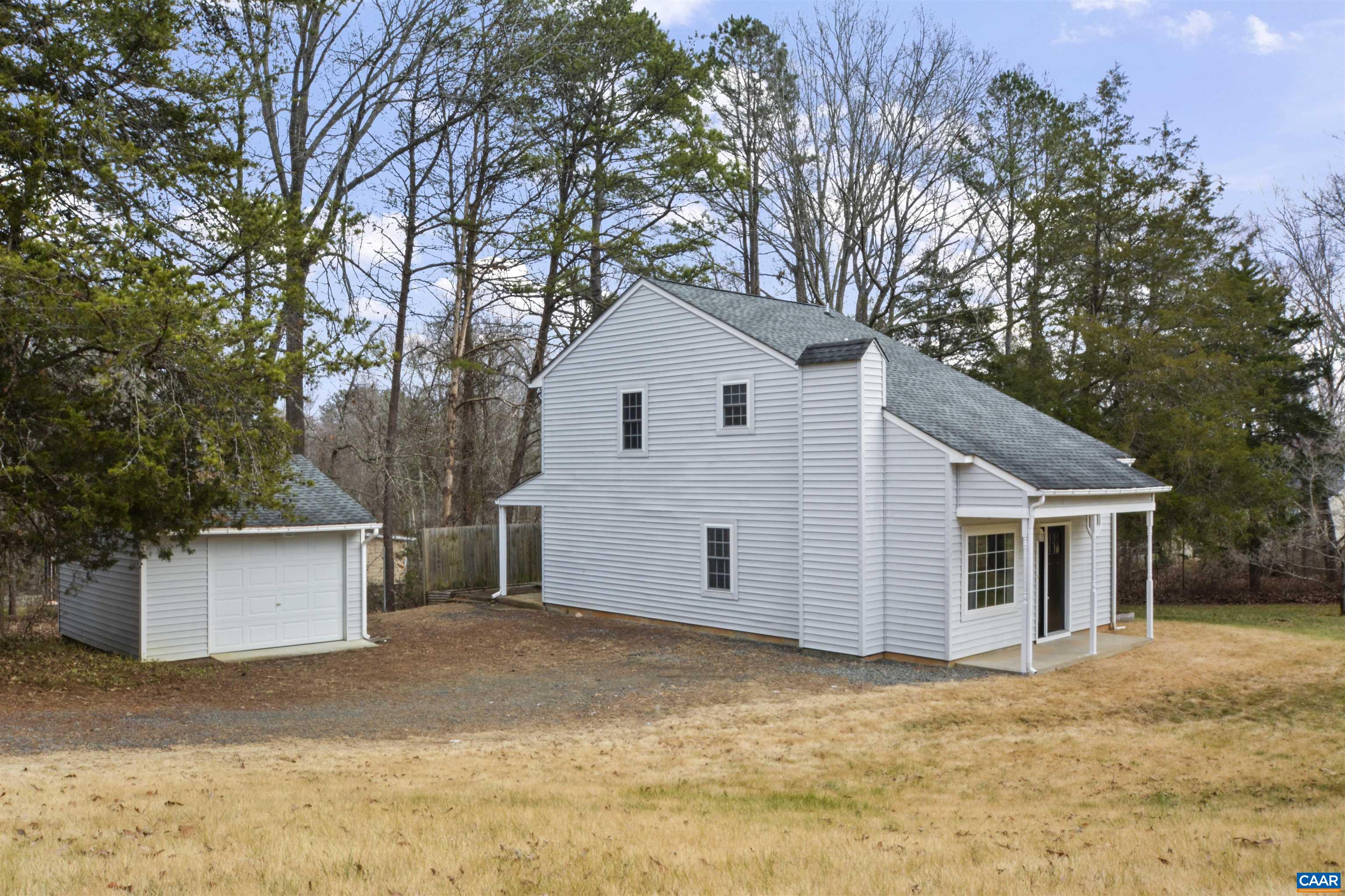 16 Petunia Road Ruckersville, VA 22968 - Photo 4 of 26 a view of a house with a yard covered in snow