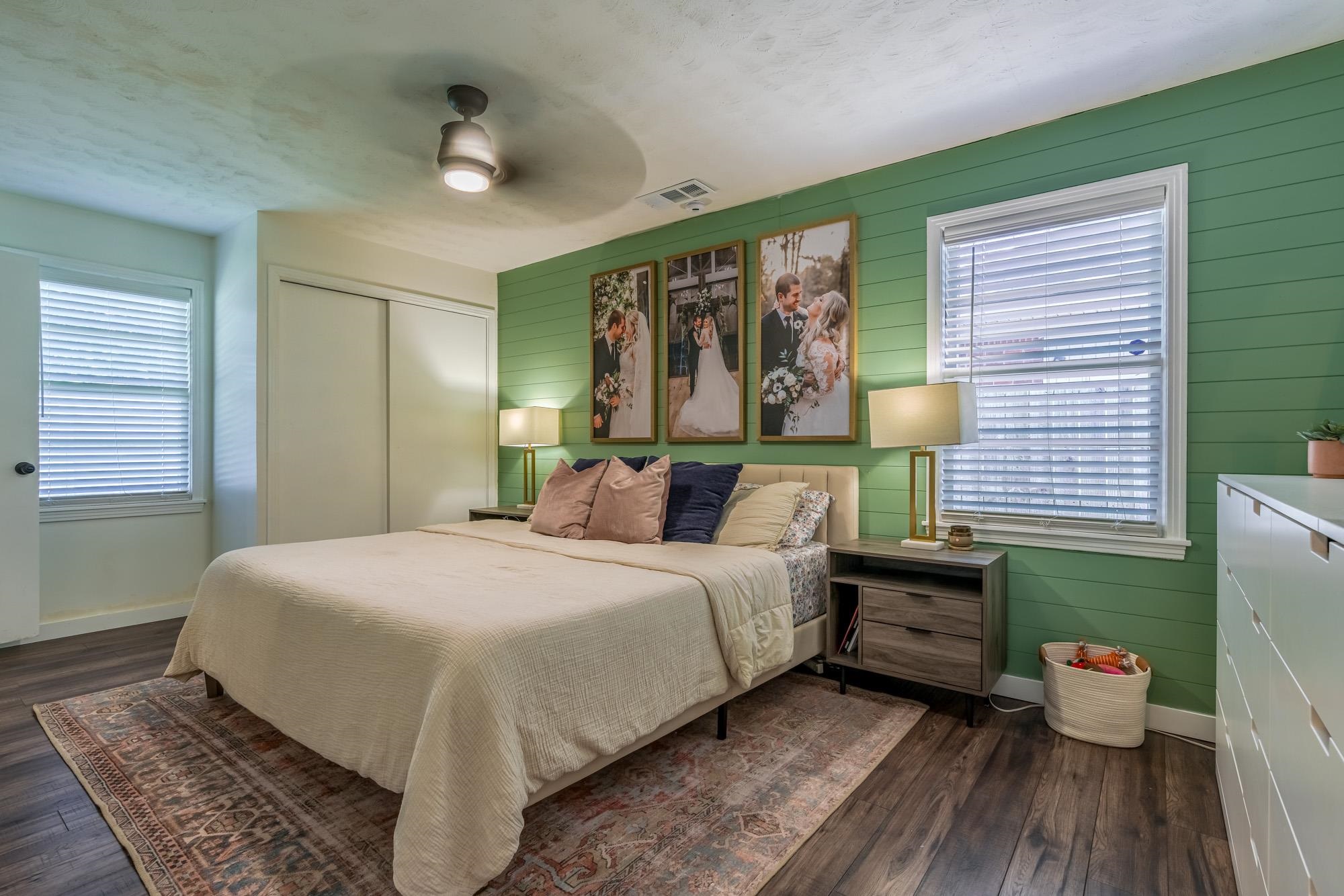 5068 Wingdale Road Memphis, TN 38117 - Photo 15 of 21 a bedroom with a bed and wooden floor
