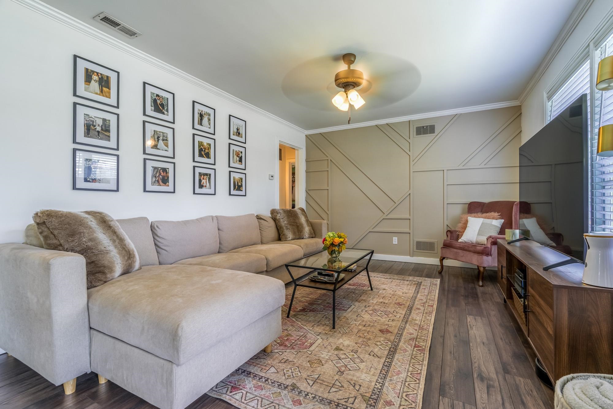 5068 Wingdale Road Memphis, TN 38117 - Photo 3 of 21 a living room with furniture and a flat screen tv