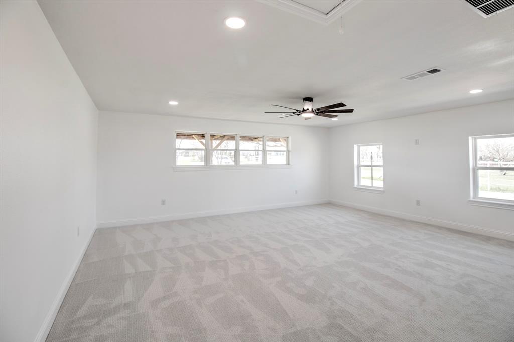 3884 Lois Road East Sanger, TX 76266 - Photo 28 of 40 a view of an empty room with a window