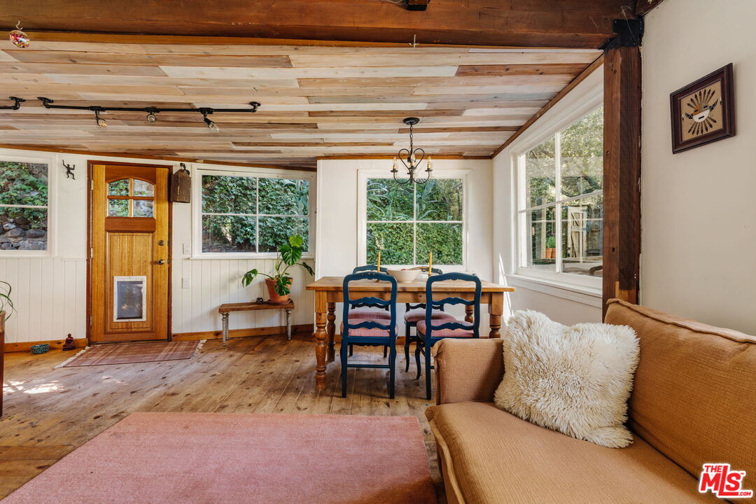 23300 Red Rock Road Topanga, CA 90290 - Photo 12 of 59 a living room with furniture and a window