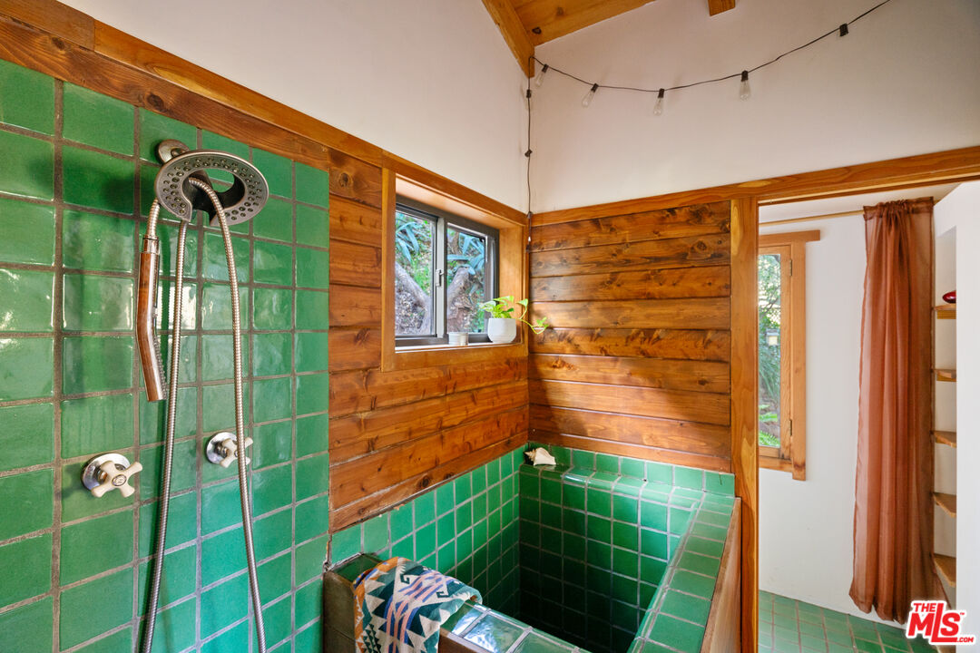 23300 Red Rock Road Topanga, CA 90290 - Photo 31 of 59 a bathroom with a shower and a sink