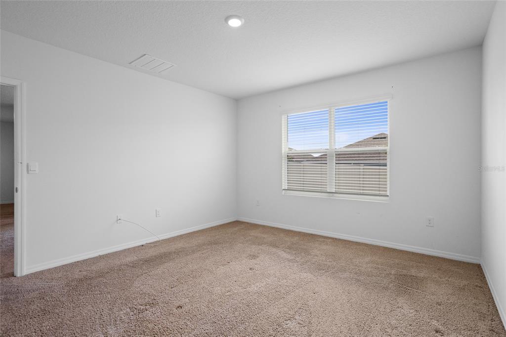 2143 Kalin Way Tavares, FL 32778 - Photo 24 of 37 an empty room with a window