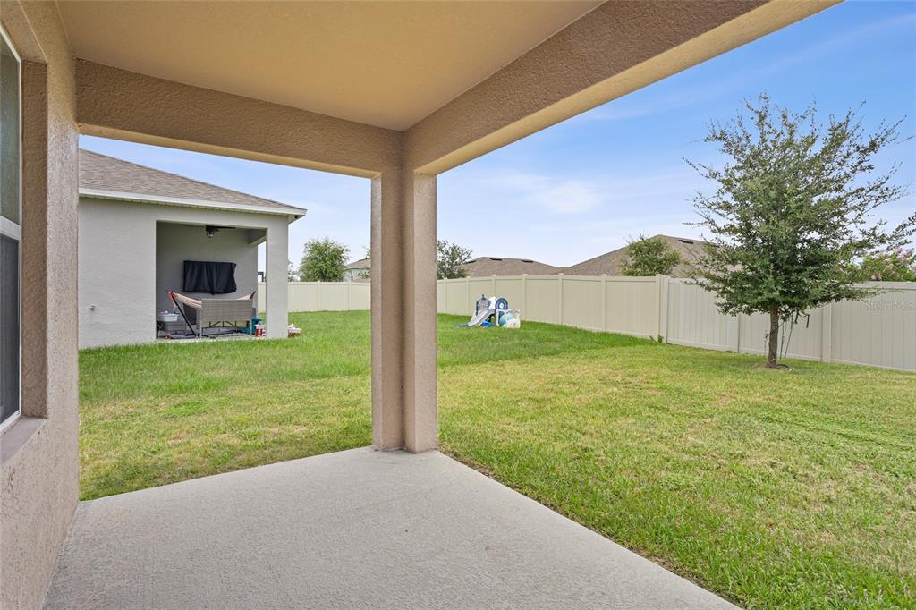 2143 Kalin Way Tavares, FL 32778 - Photo 34 of 37 a view of a backyard with garden