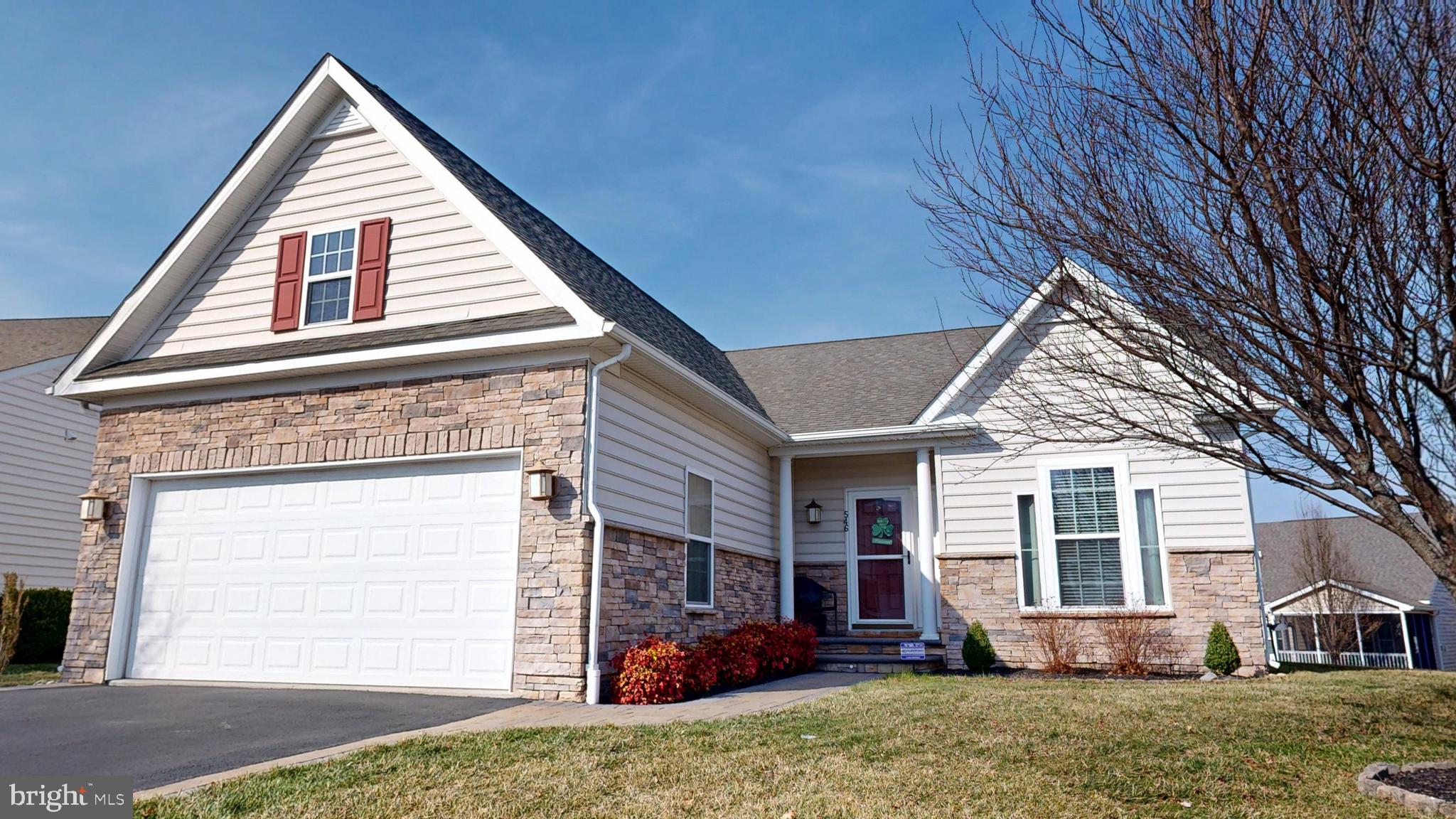 a view of house with backyard of house
