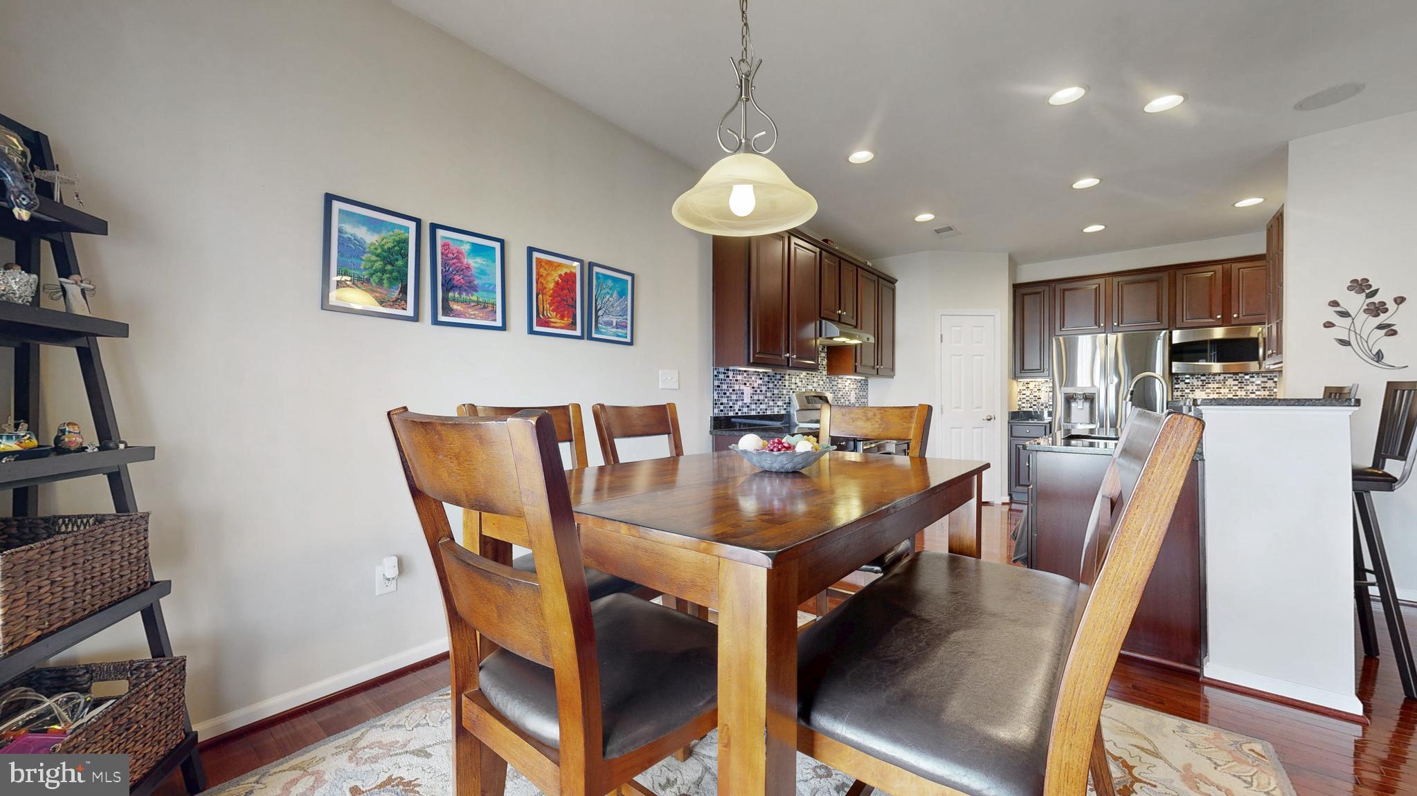 546 Stonehaven Drive Townsend, DE 19734 - Photo 14 of 60 a view of a dining room with furniture