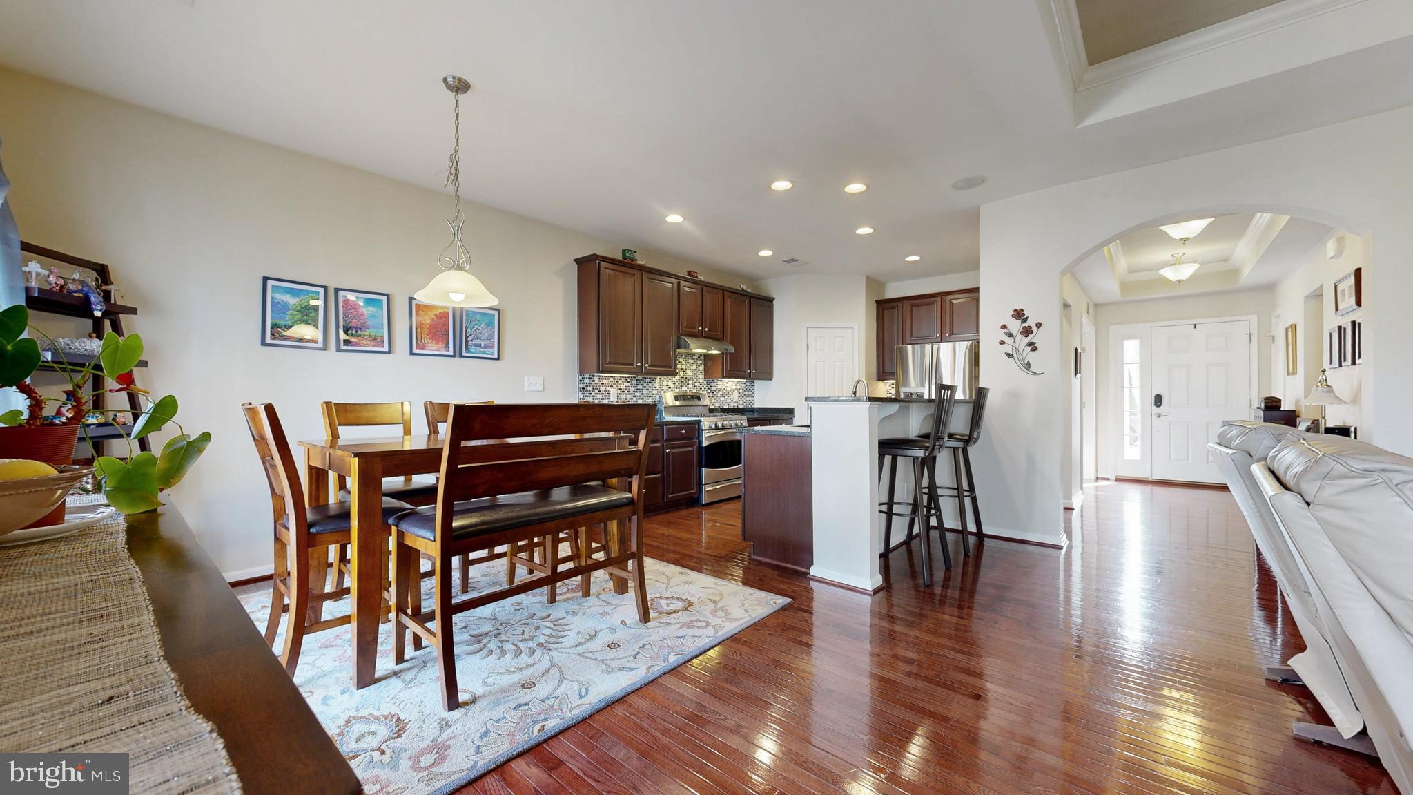 546 Stonehaven Drive Townsend, DE 19734 - Photo 16 of 60 a living room with furniture and a wooden floor