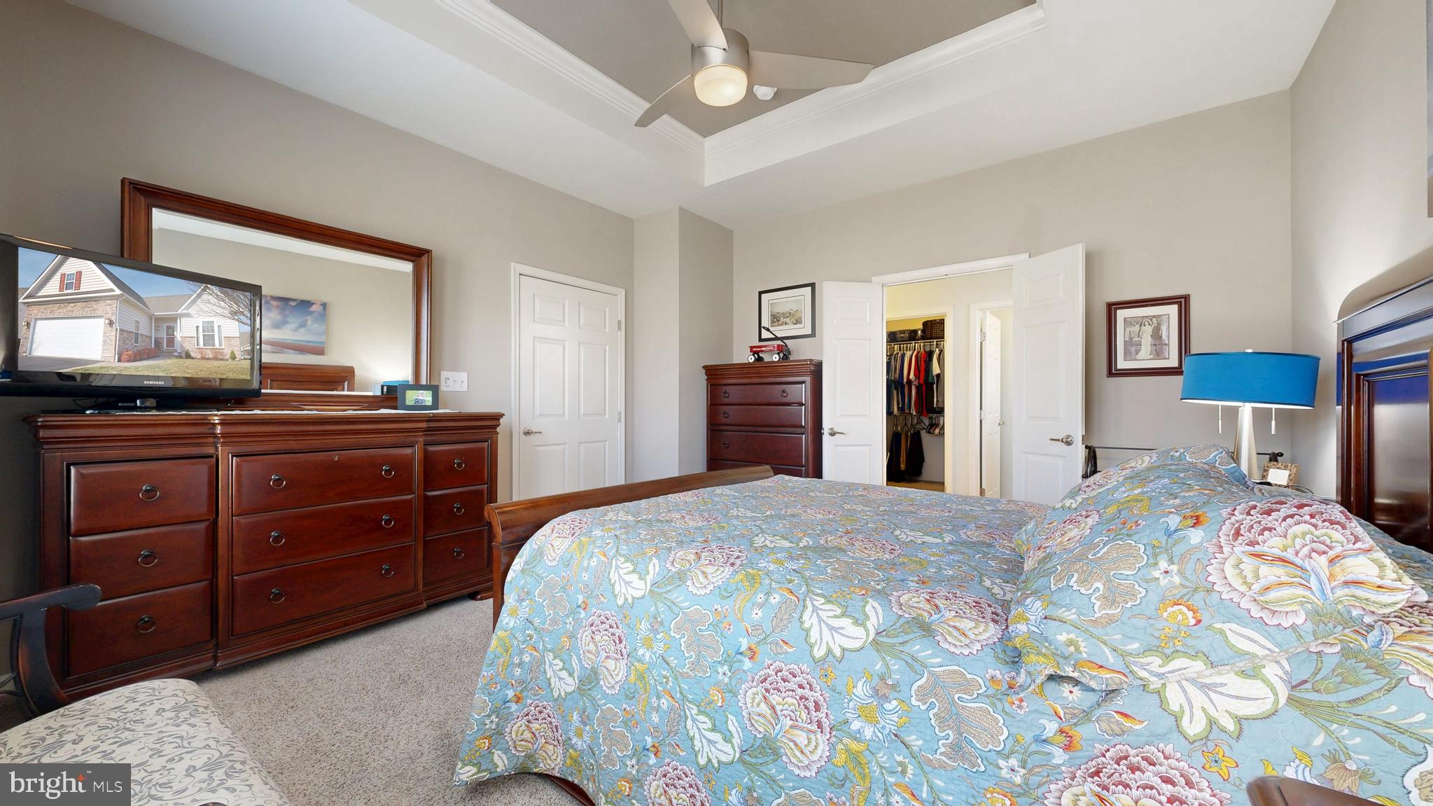 546 Stonehaven Drive Townsend, DE 19734 - Photo 26 of 60 a bedroom with a bed and a dresser