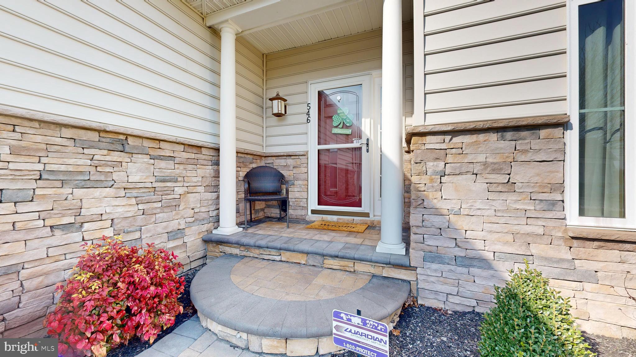 546 Stonehaven Drive Townsend, DE 19734 - Photo 3 of 60 a bath room with a fireplace and painted walls