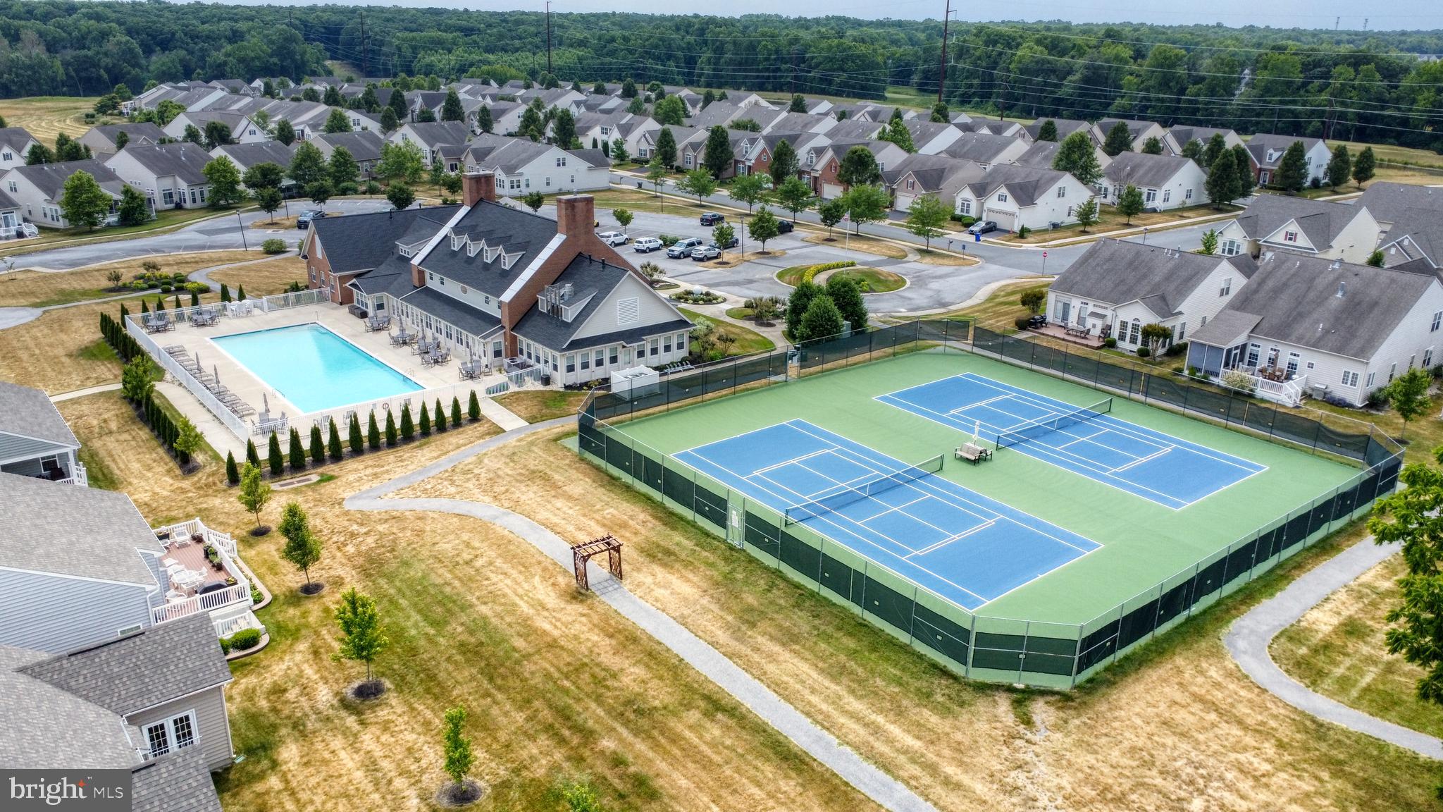 546 Stonehaven Drive Townsend, DE 19734 - Photo 57 of 60 a view of a tennis ground with furniture