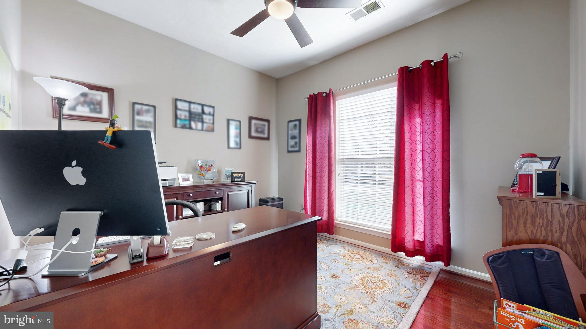 546 Stonehaven Drive Townsend, DE 19734 - Photo 7 of 60 a room with furniture and a window