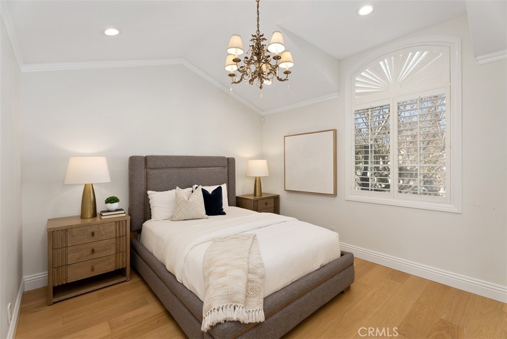 74 Chandon Newport Coast, CA 92657 - Photo 16 of 27 a bedroom with bed and a window