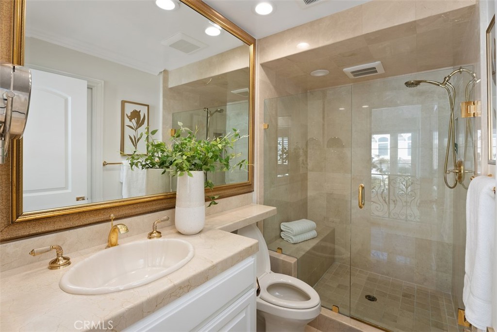 74 Chandon Newport Coast, CA 92657 - Photo 18 of 27 a bathroom with a sink toilet and shower