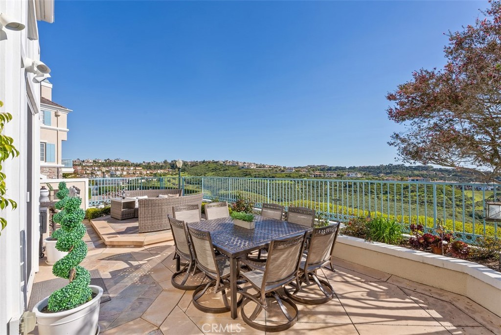 74 Chandon Newport Coast, CA 92657 - Photo 19 of 27 a view of a terrace with furniture and garden