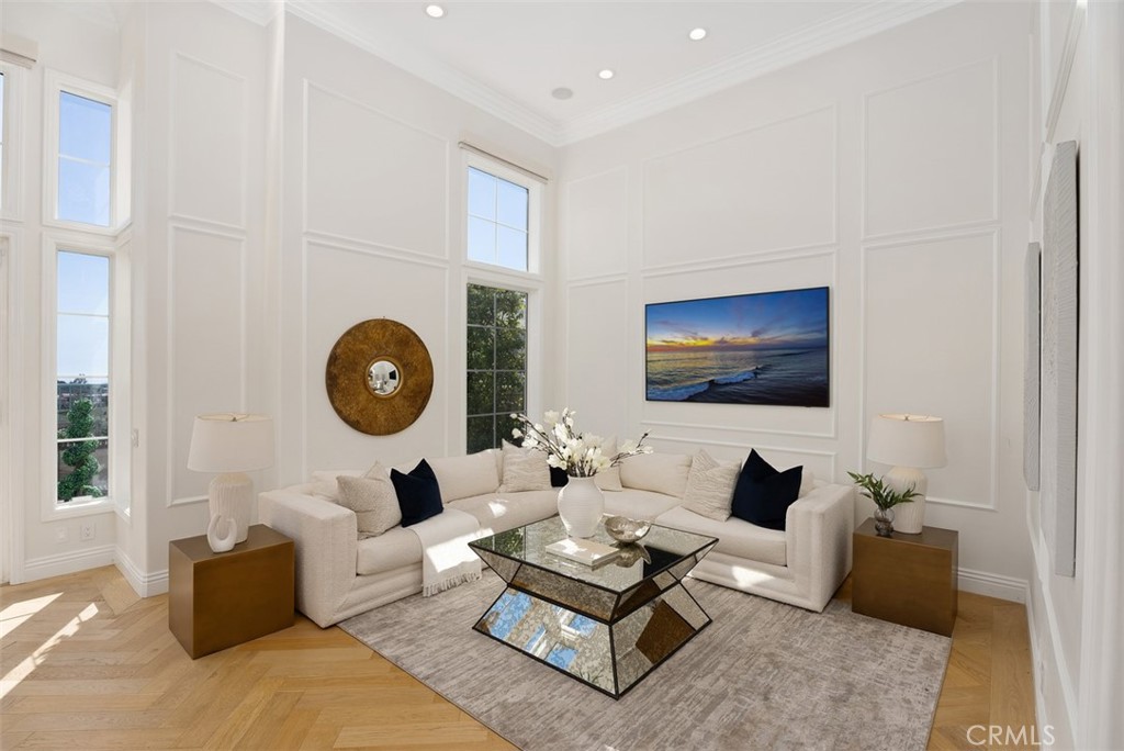 74 Chandon Newport Coast, CA 92657 - Photo 4 of 27 a living room with furniture a rug and a window