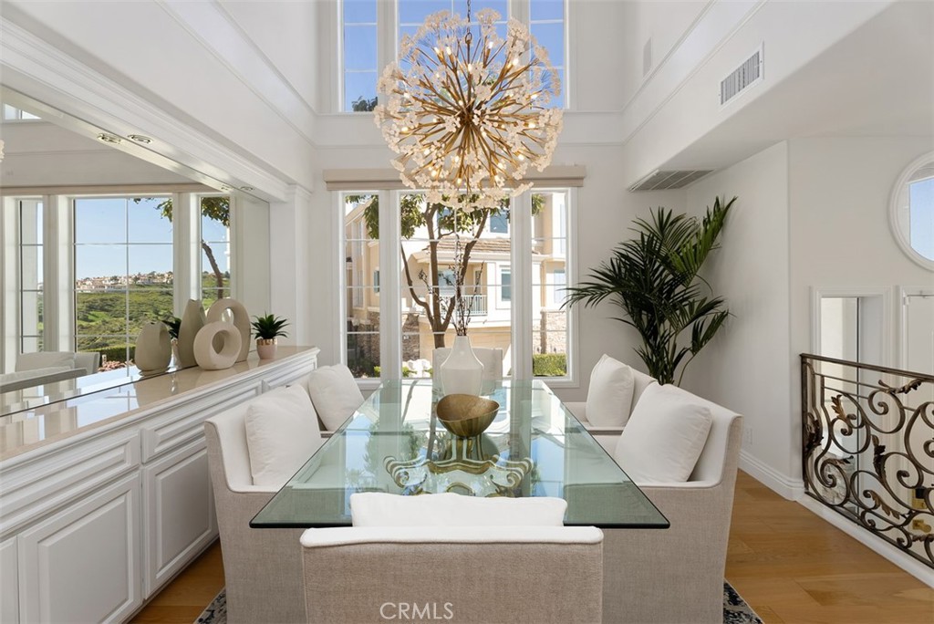74 Chandon Newport Coast, CA 92657 - Photo 7 of 27 a view of living room with furniture and a chandelier