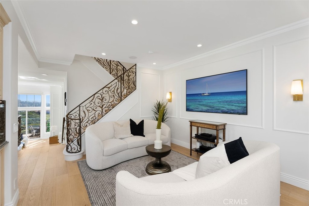 74 Chandon Newport Coast, CA 92657 - Photo 8 of 27 a living room with furniture and a flat screen tv