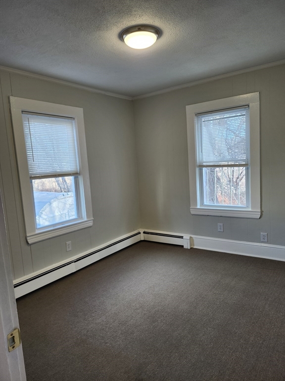 68 Valley Street, Unit 1 Wakefield, MA 01880 - Photo 6 of 7 an empty room with a window