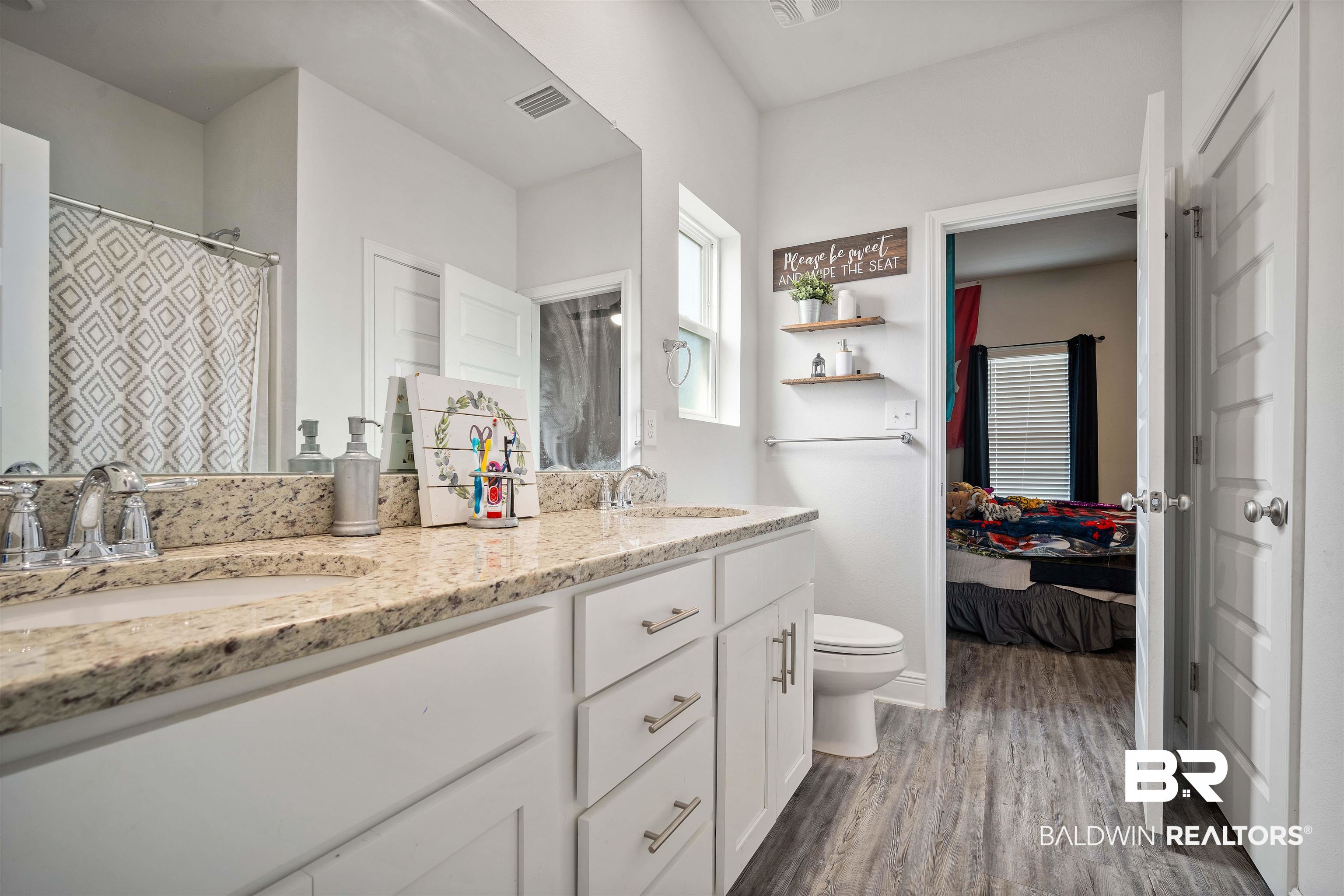 24341 Alydar Loop Daphne, AL 36526 - Photo 28 of 45 Ensuite bathroom with wood finished floors, toilet, and double vanity