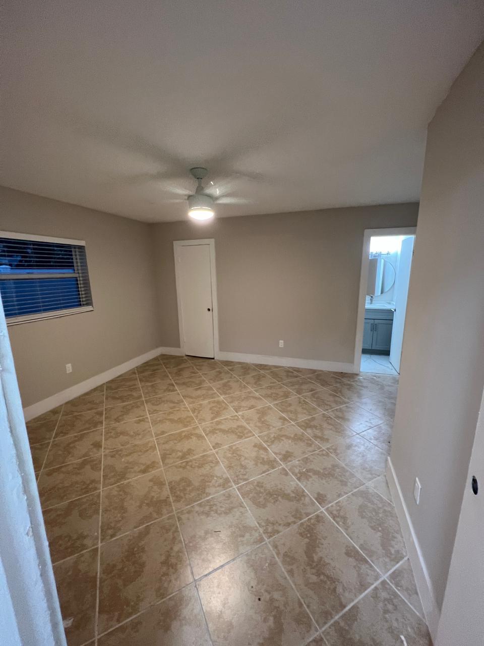 9675 Southwest 1st Place Boca Raton, FL 33428 - Photo 3 of 11 a view of an empty room