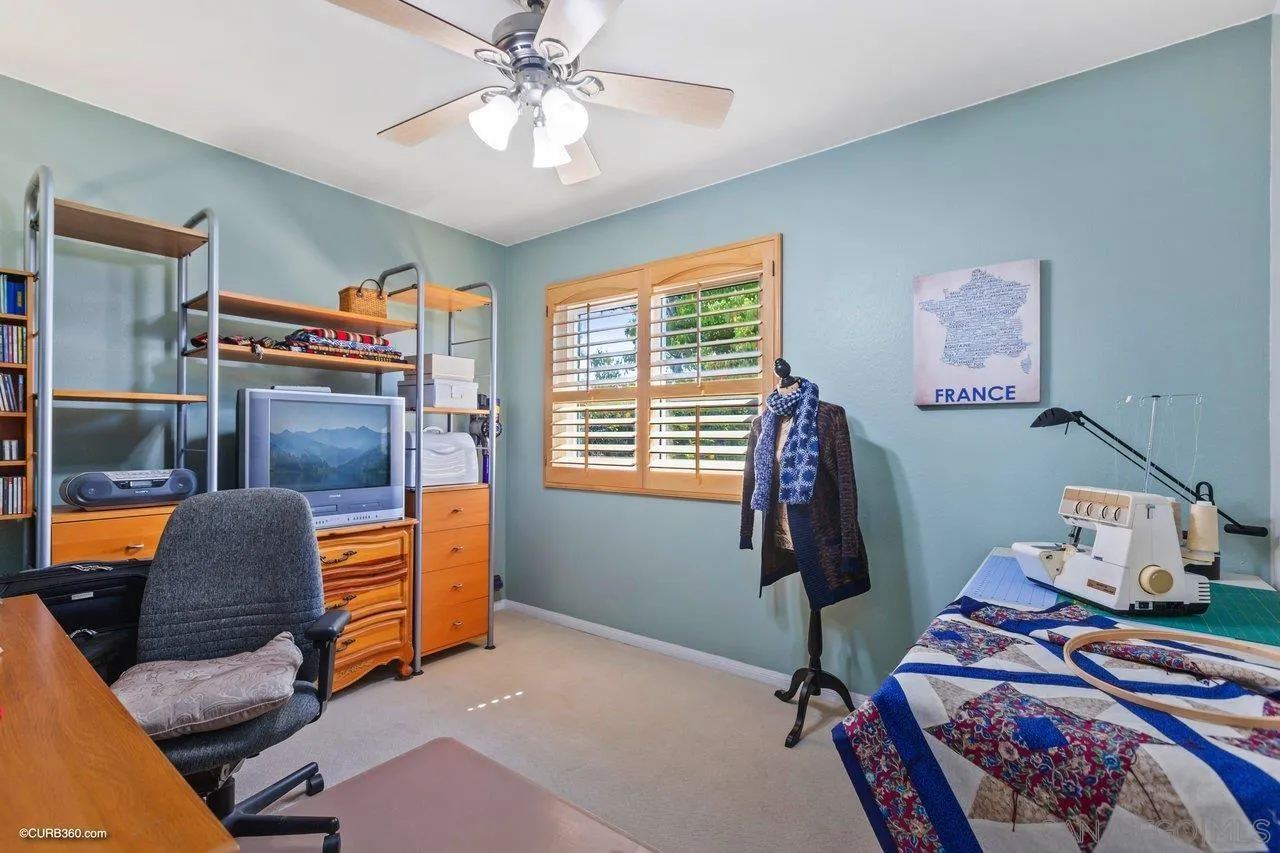 744 Roca Road Chula Vista, CA 91910 - Photo 17 of 24 a bedroom with furniture and a window